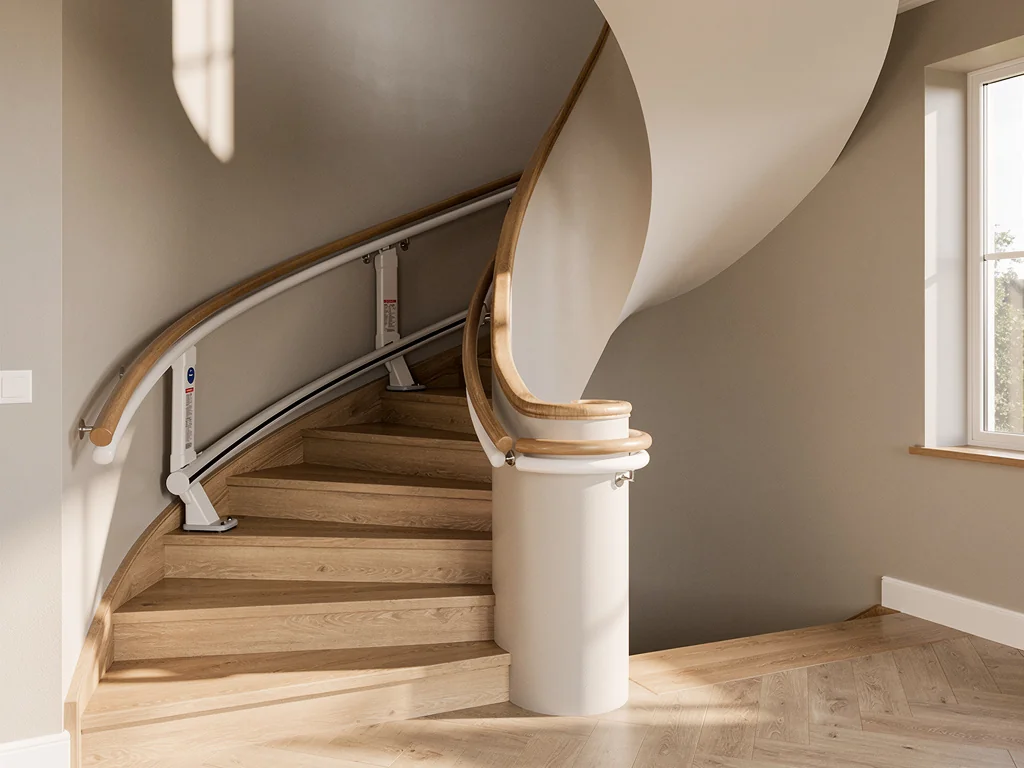 Rail courbe de monte-escalier épousant le virage d'un escalier avec palier